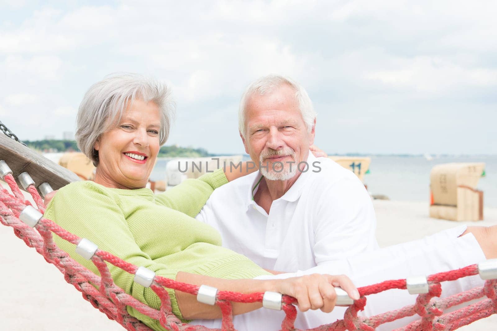 Happy senior couple on the beach