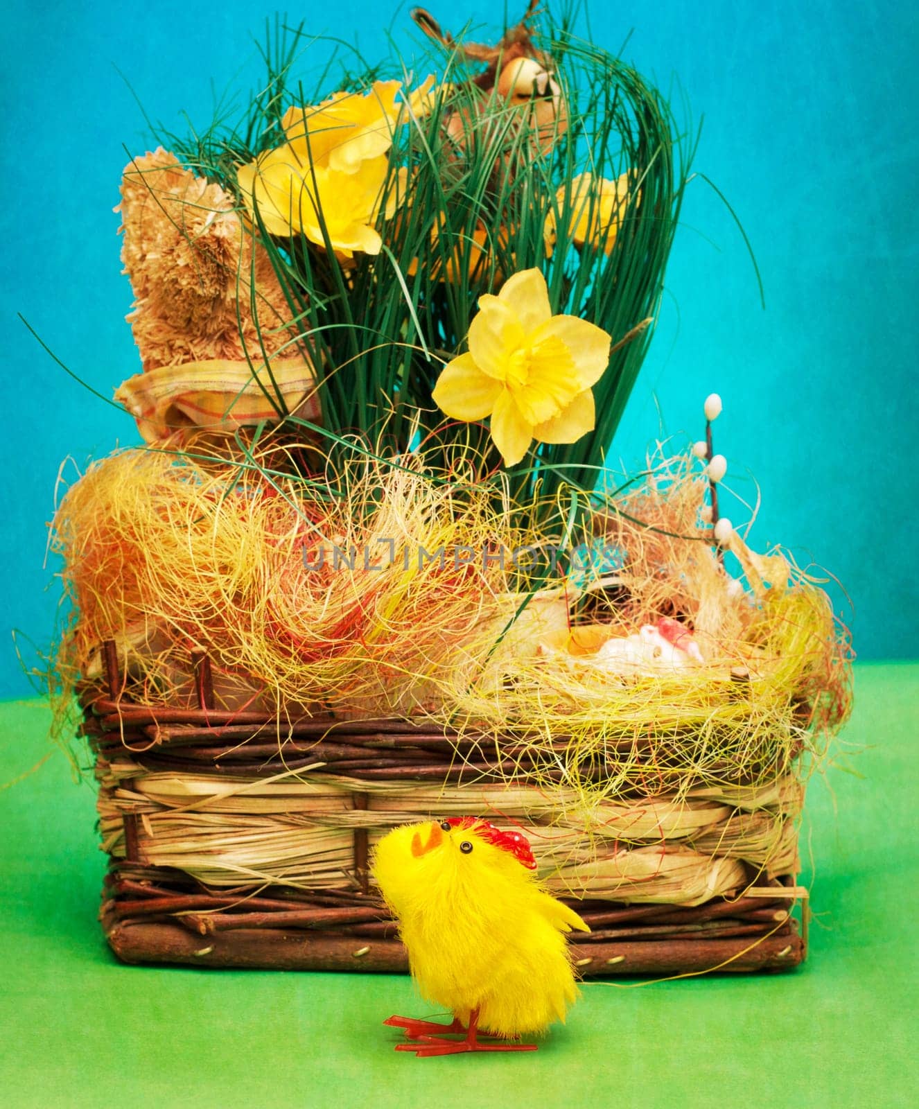 vintage basket with easter eggs and little chicken