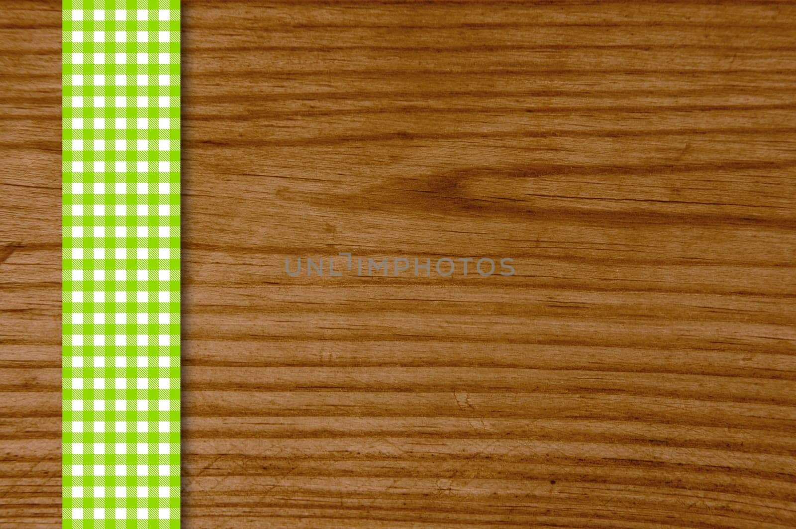 Wooden board with green and white blanket strip