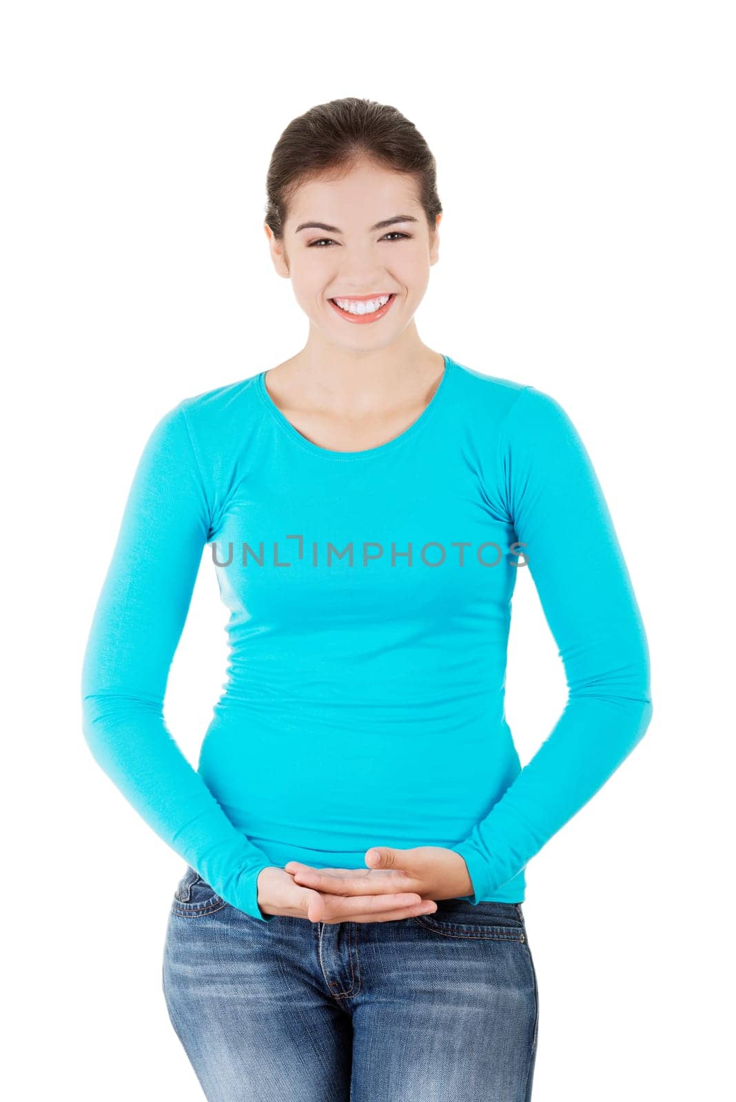 Happy ,excited young woman presenting copy space on her palm,isolated on white