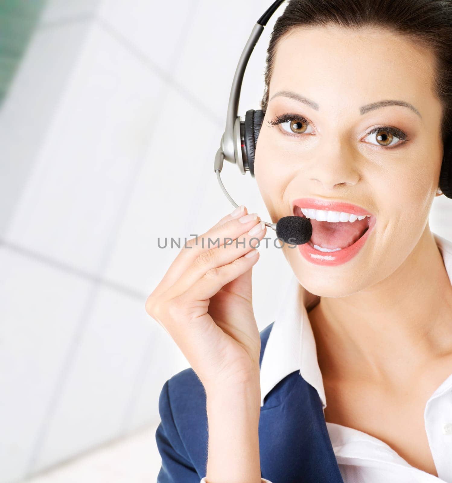 Beautiful young call-center assistant speaking