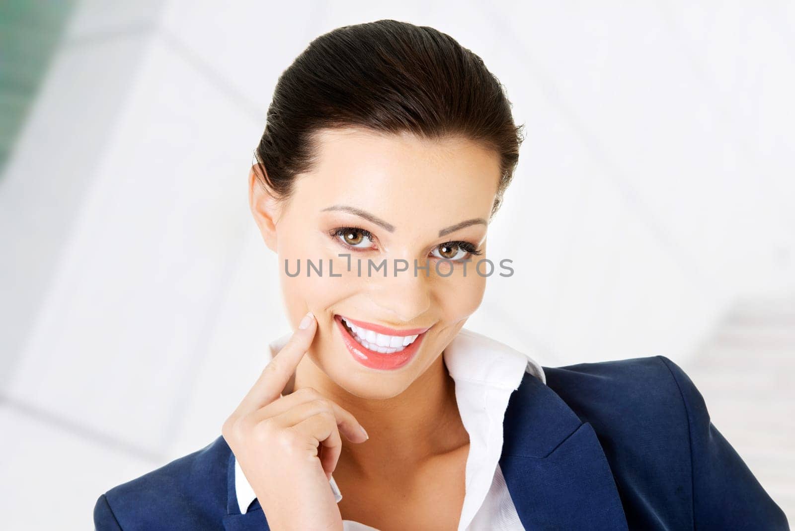 portrait of young businesswoman or student in elegant clothes