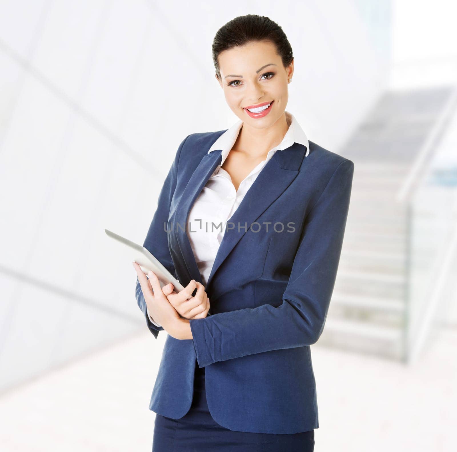 attractive business woman using digital tablet computer pc