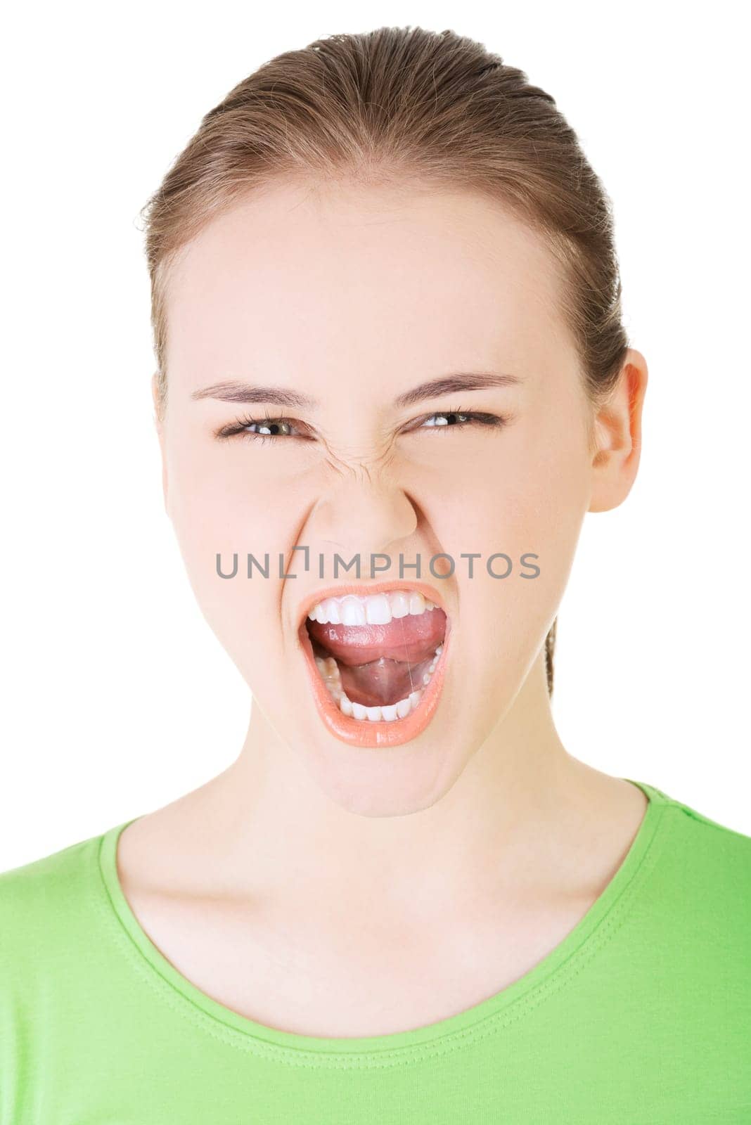 young casual woman screaming with anger,isolated on white