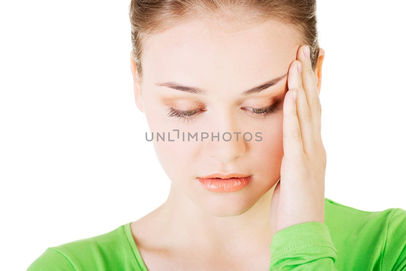 Young beautiful woman in depression,isolated on white