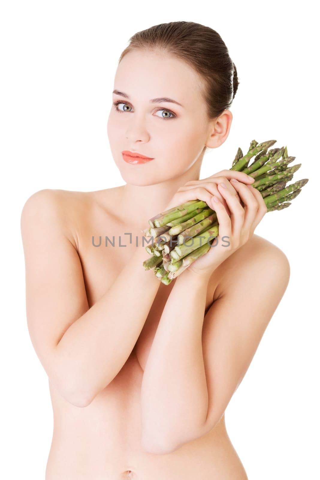 beautiful fit woman with asparagus,isolated on white