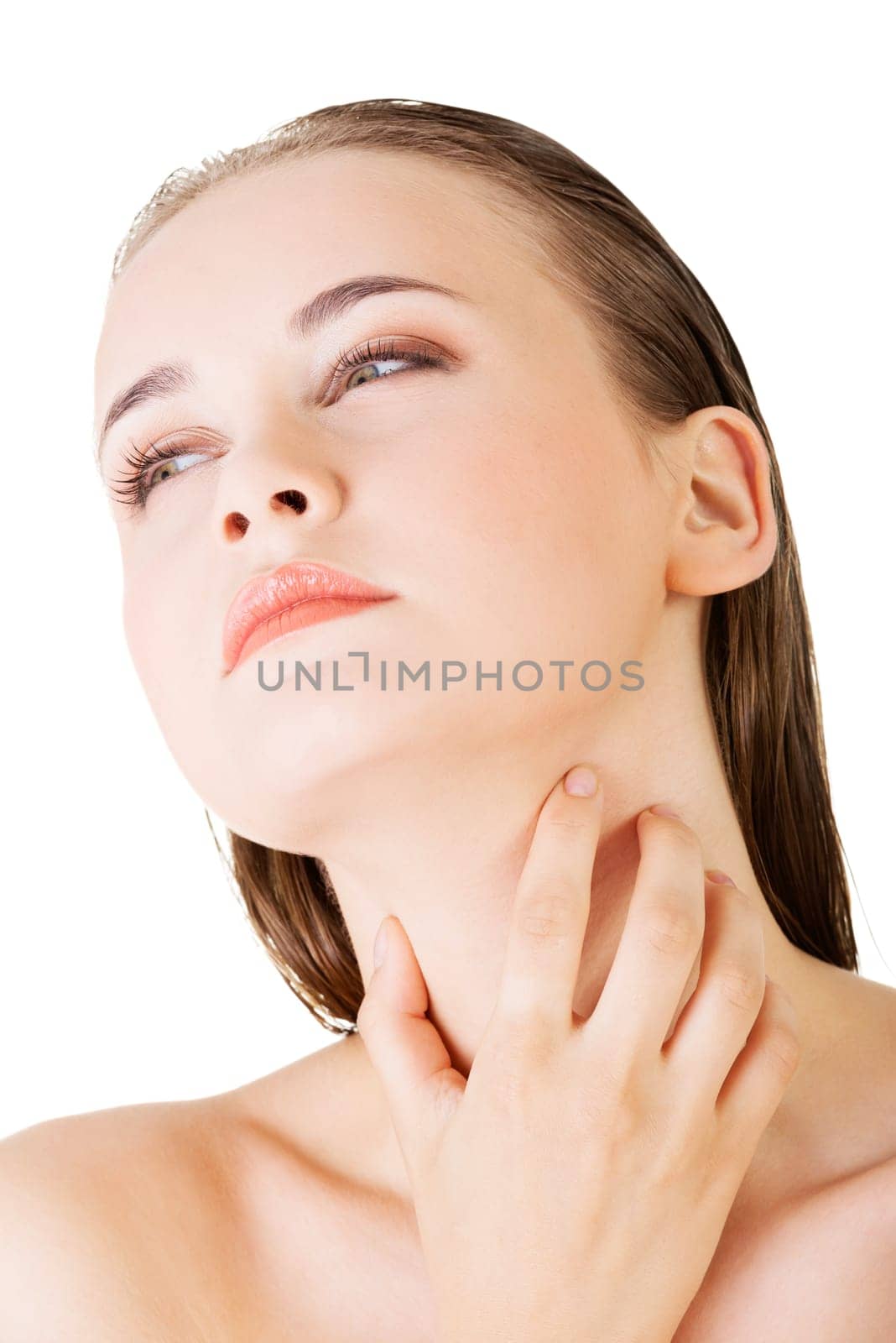beautiful sensual young woman touching her neck,isolated on white