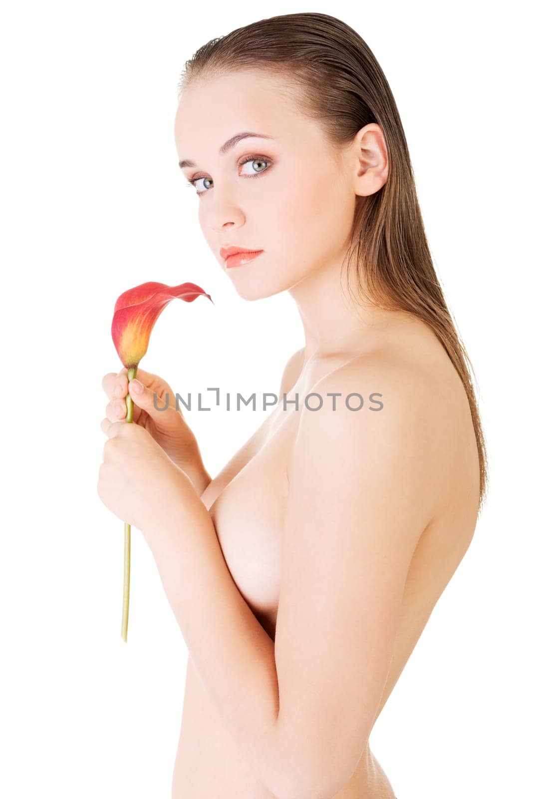 beauty face of the young beautiful woman with flower. girl on white background