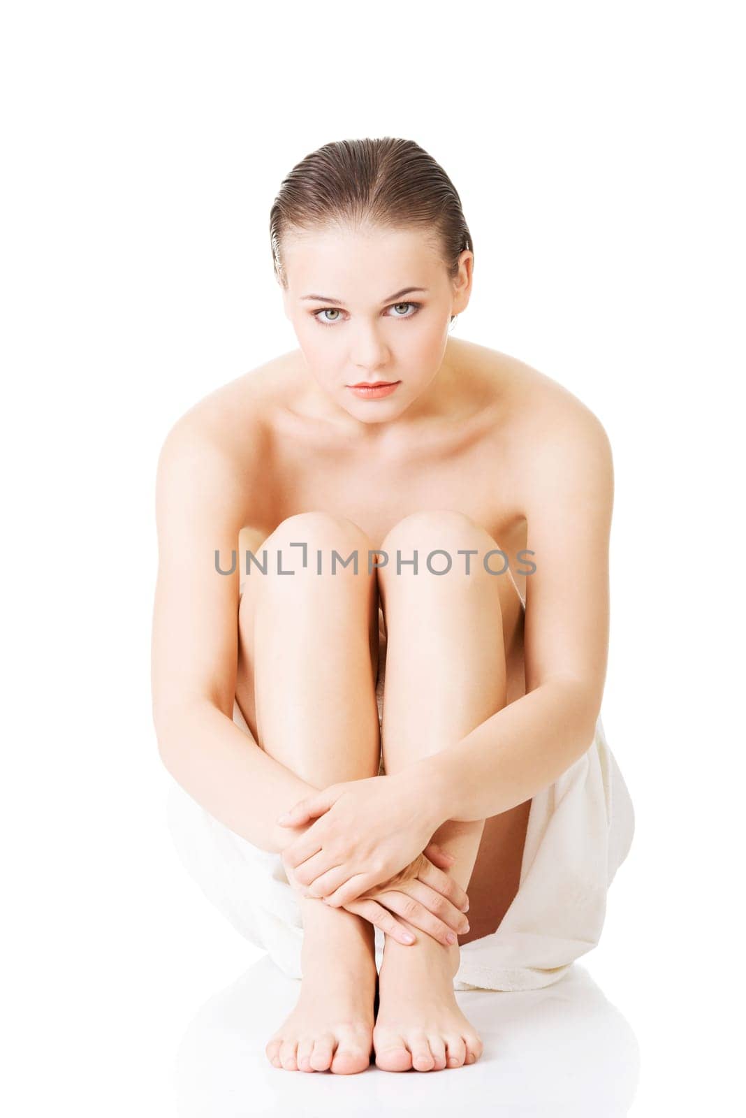beautiful nude woman with towel,isolated on white