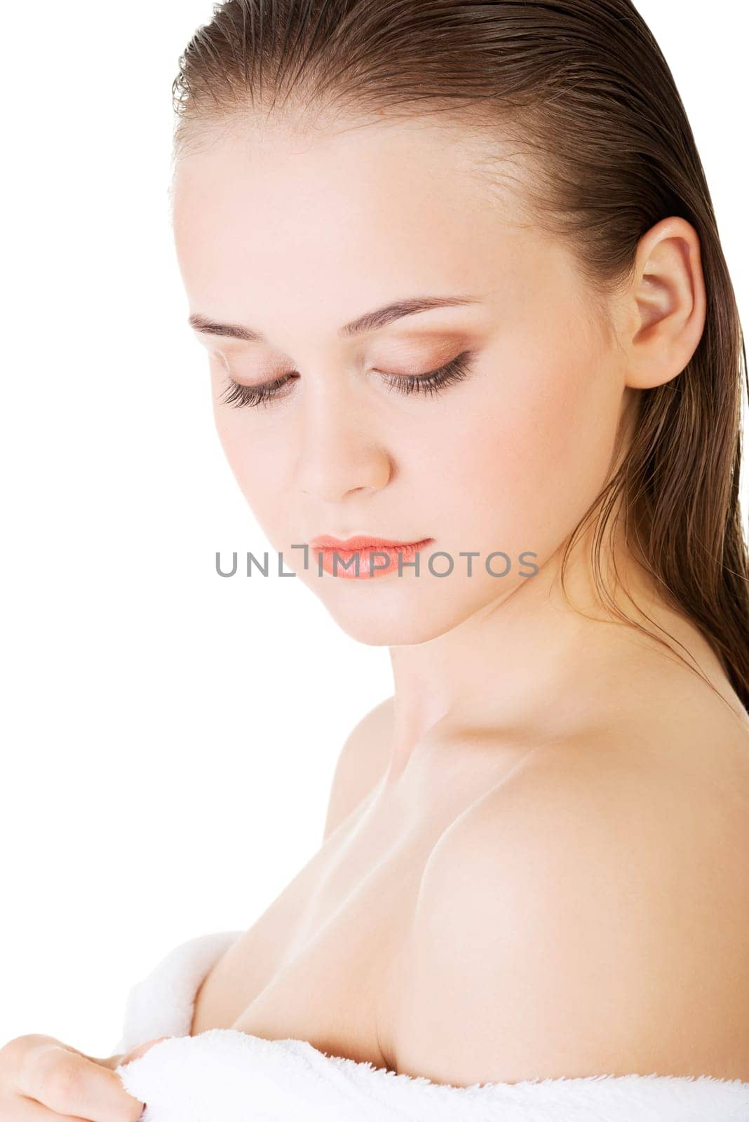attractive woman with a bathrobe,isolated on white