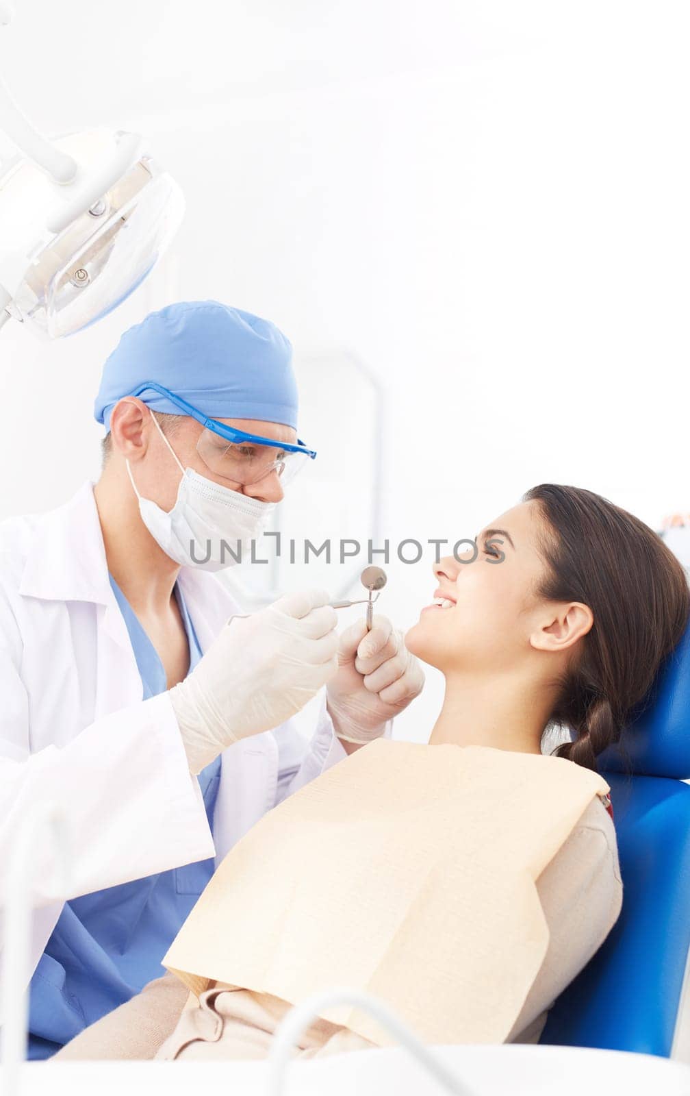 Young girl during oral checkup at the dentist’s