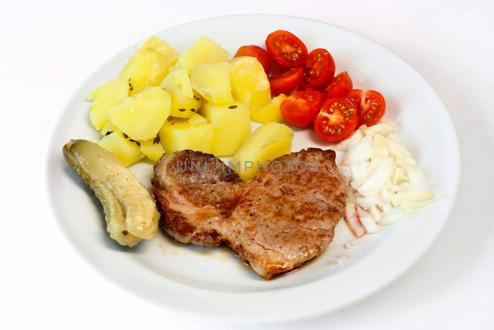 Detail of the Pork Steak with potatoes - Neck of Pork Chops Fried