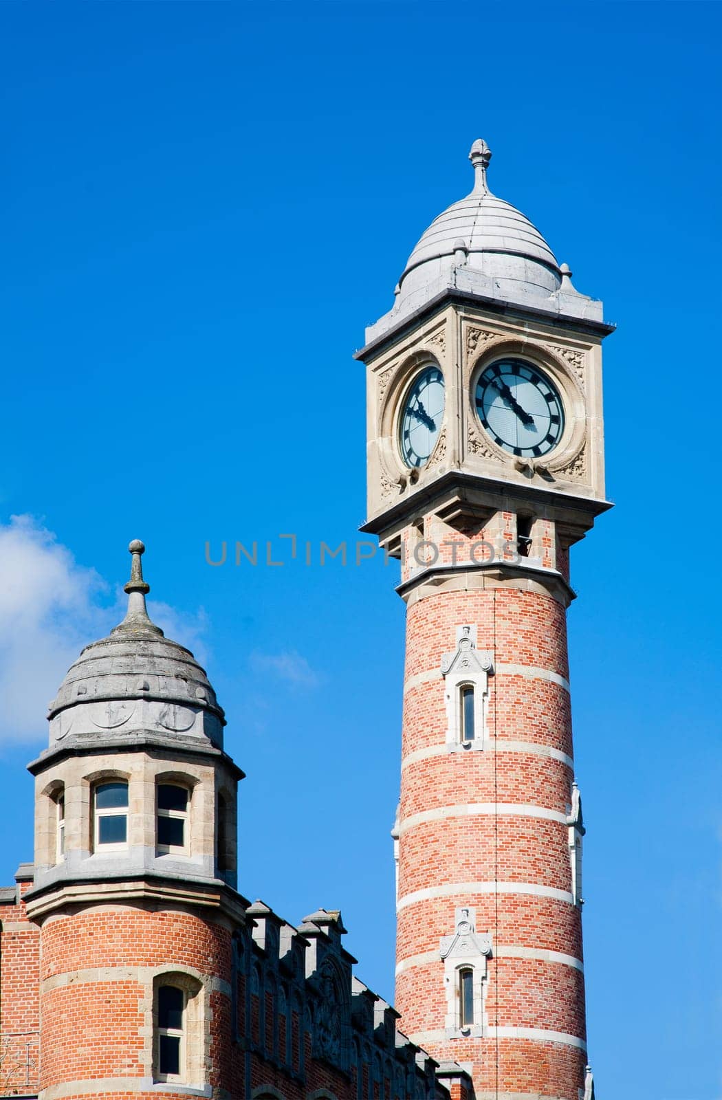Clock tower of the Sint-Pieter railway station in Ghent, Belgium.