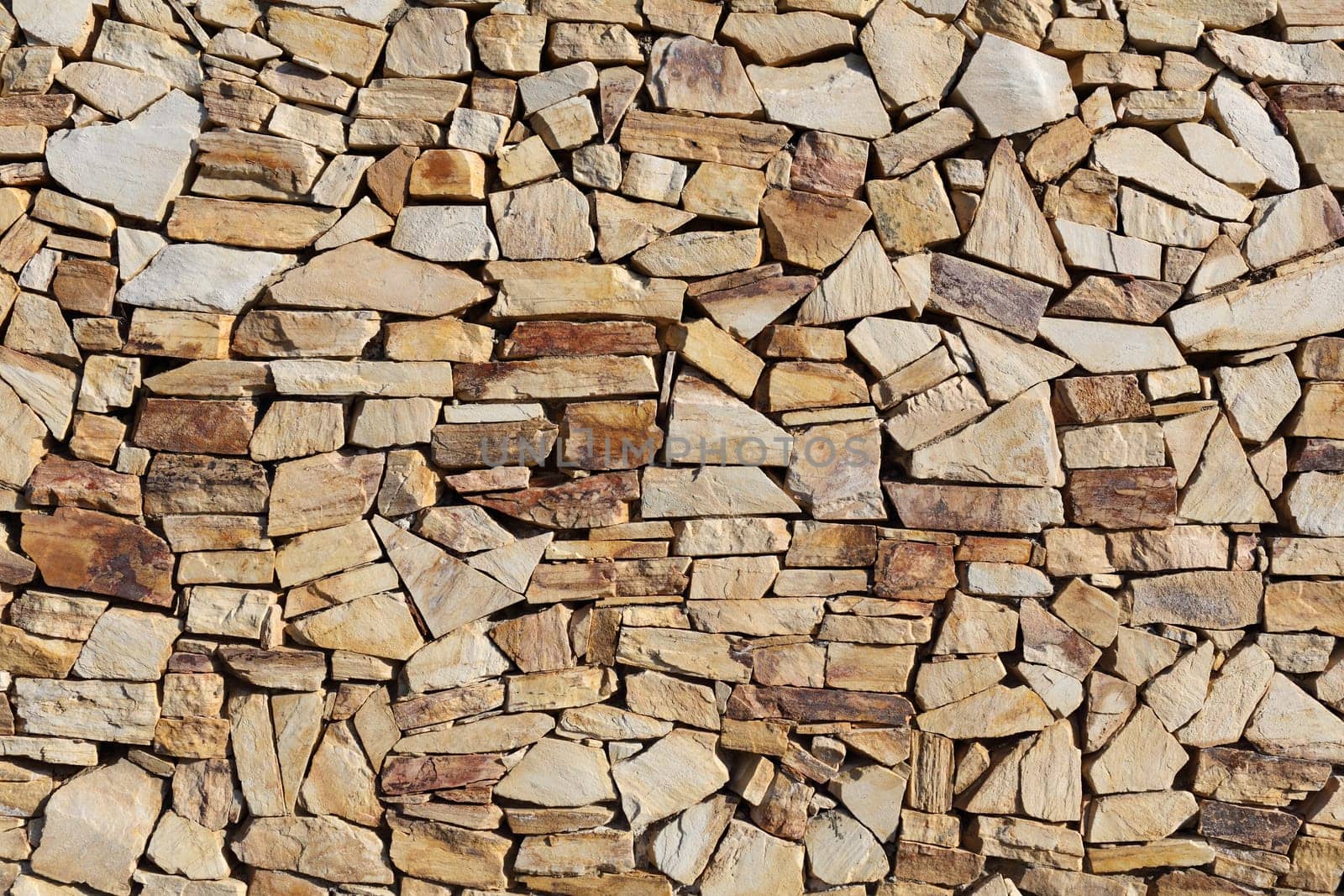 Details of an outdoors stone wall in Spain.