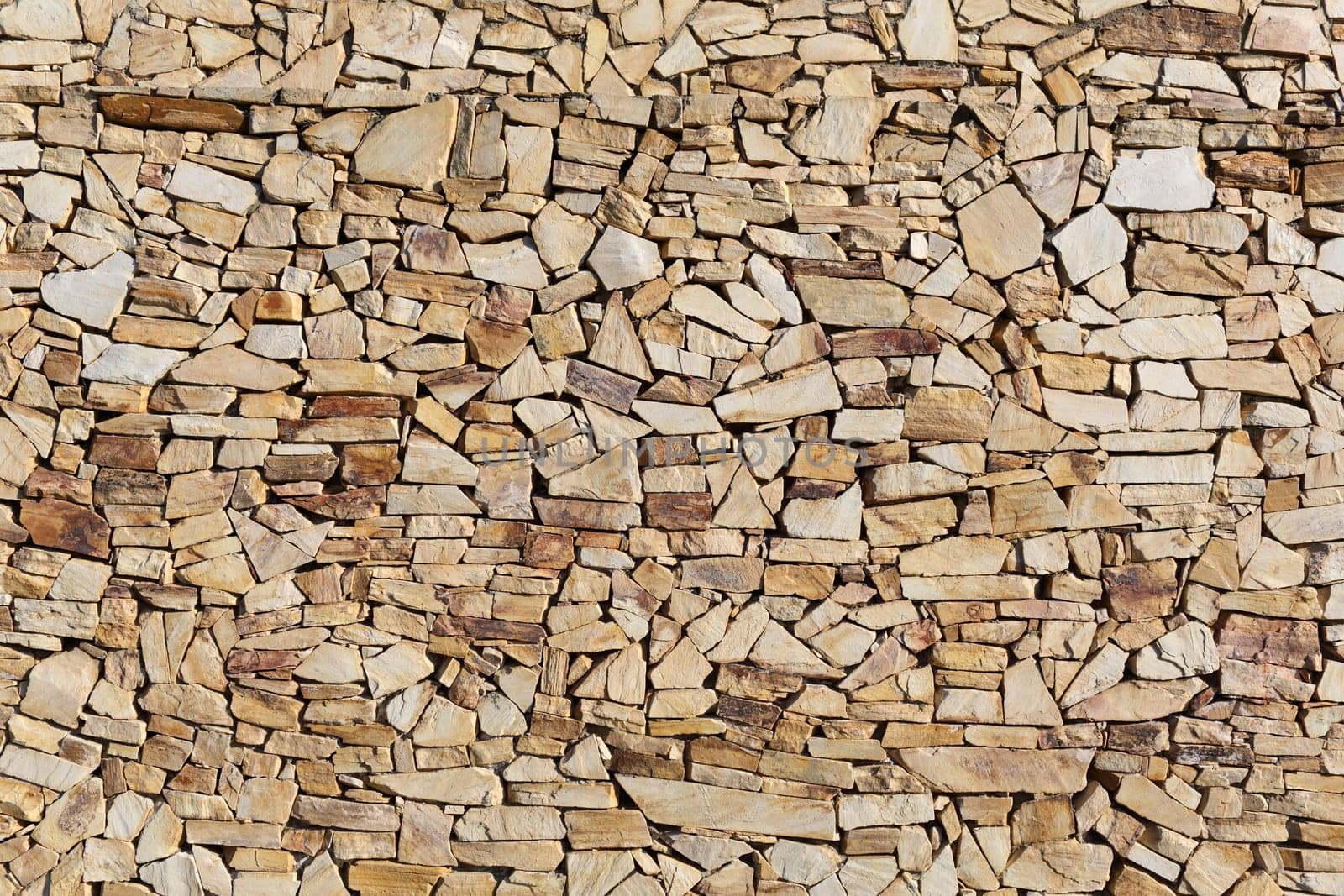 Details of an outdoors stone wall in Spain.