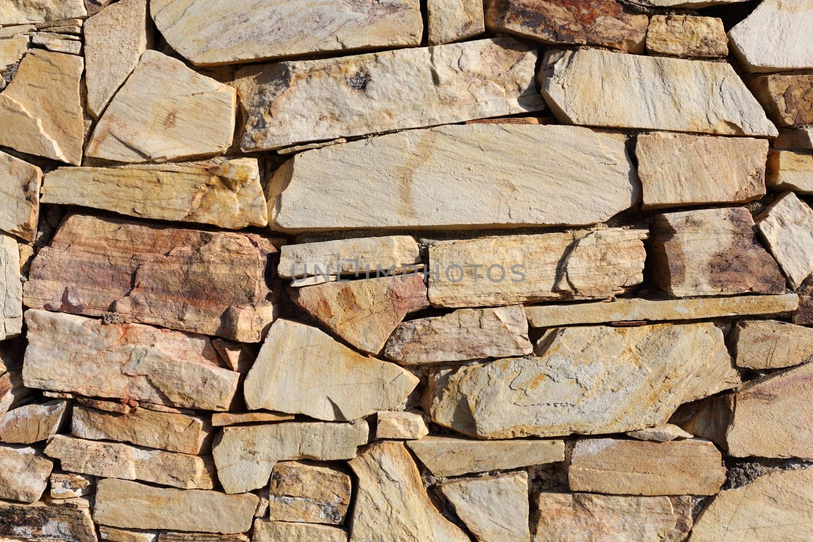 Details of an outdoors stone wall in Spain.