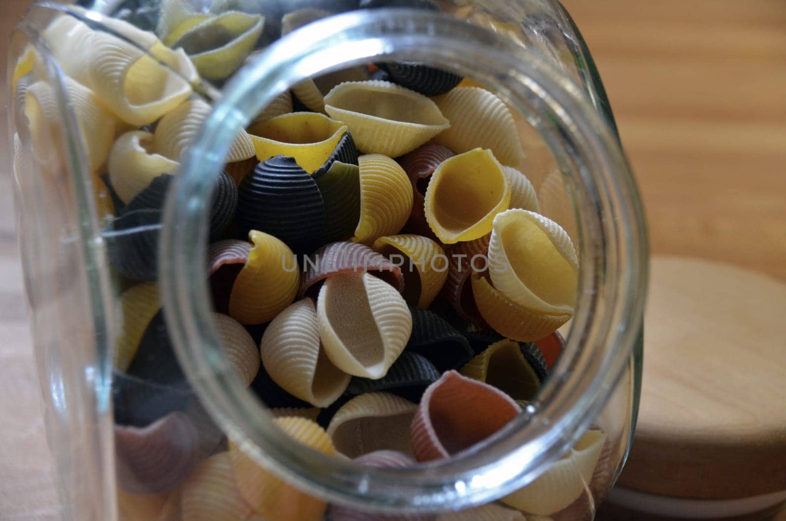Colourful noodles in a glass
