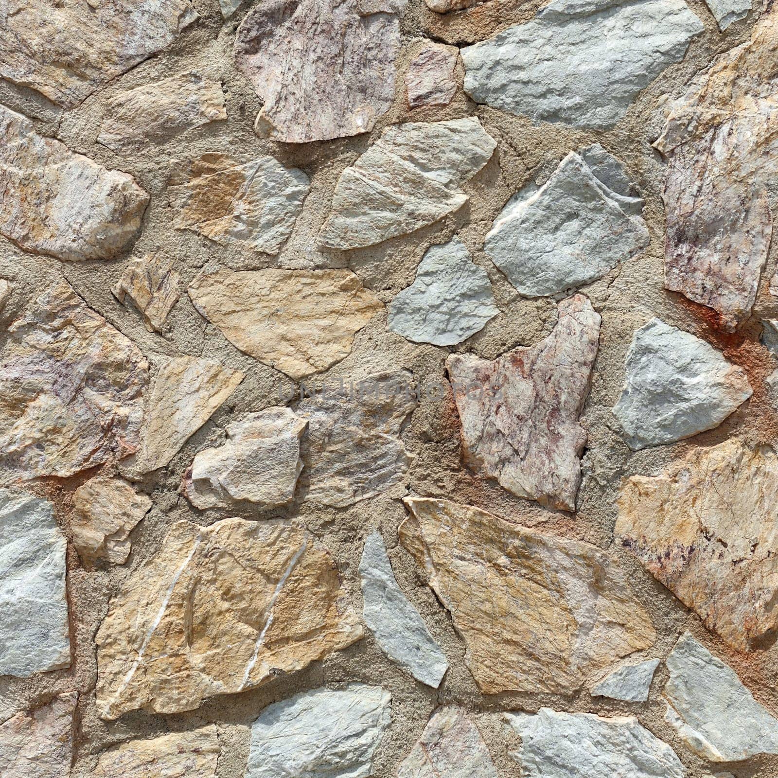Details of an outdoors stone wall in Spain.