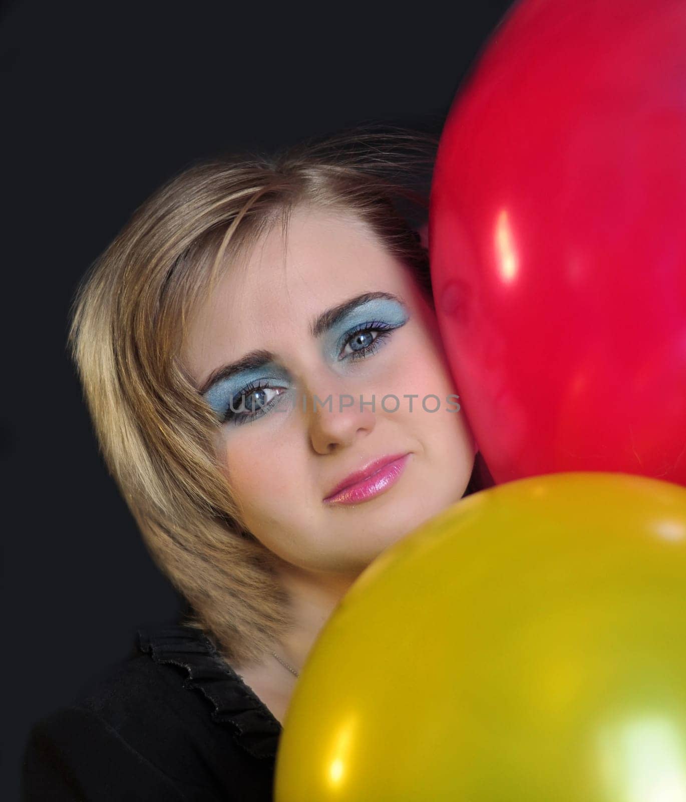 happy cute woman with balloons