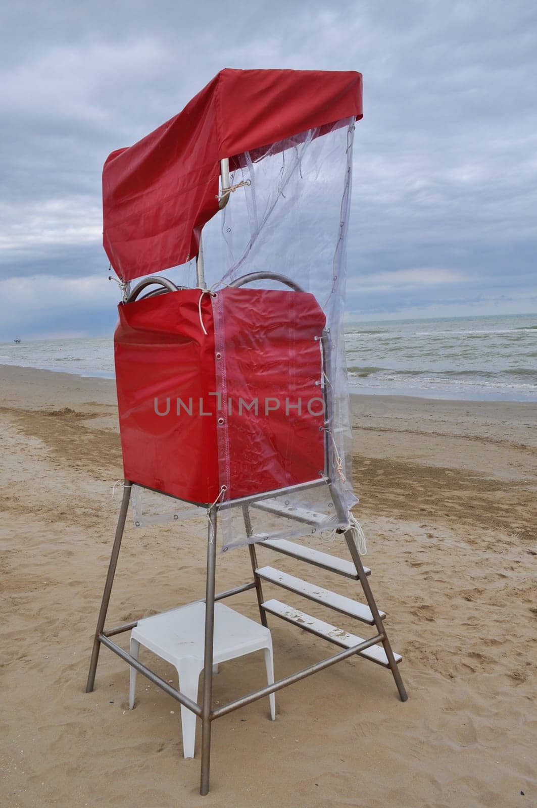 Lifeguard watch tower on the beach on the seaside