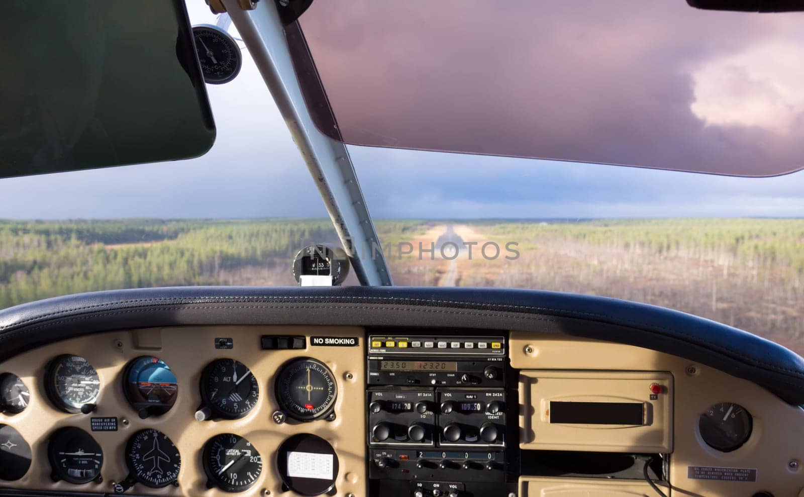 Cockpit view from small aircraft taking off from runway