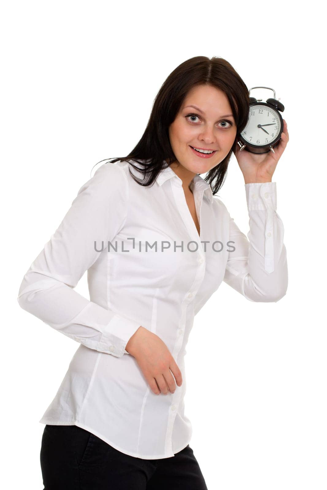 beautiful girl with alarm clock isolated on white