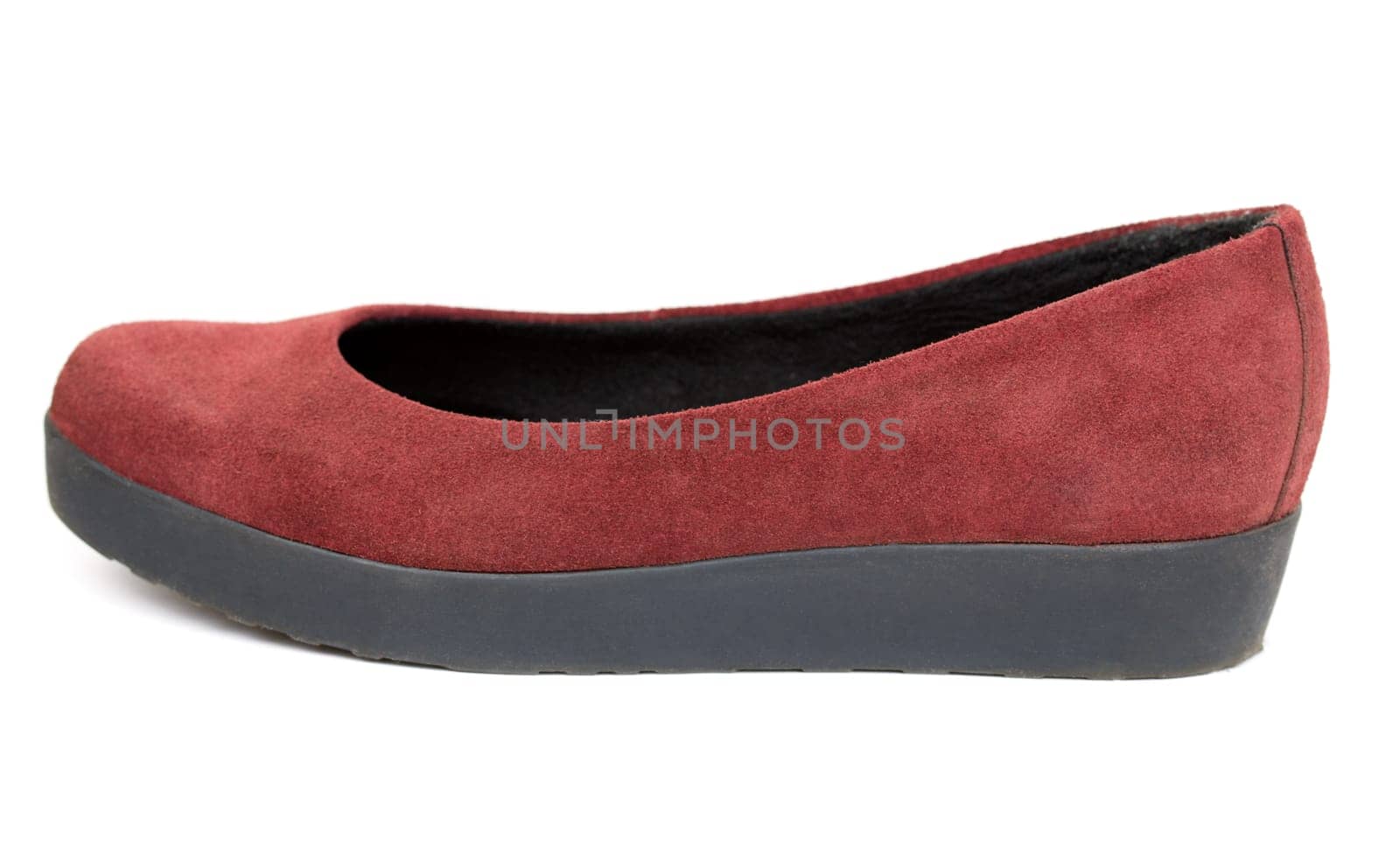 One red female shoe isolated on white background