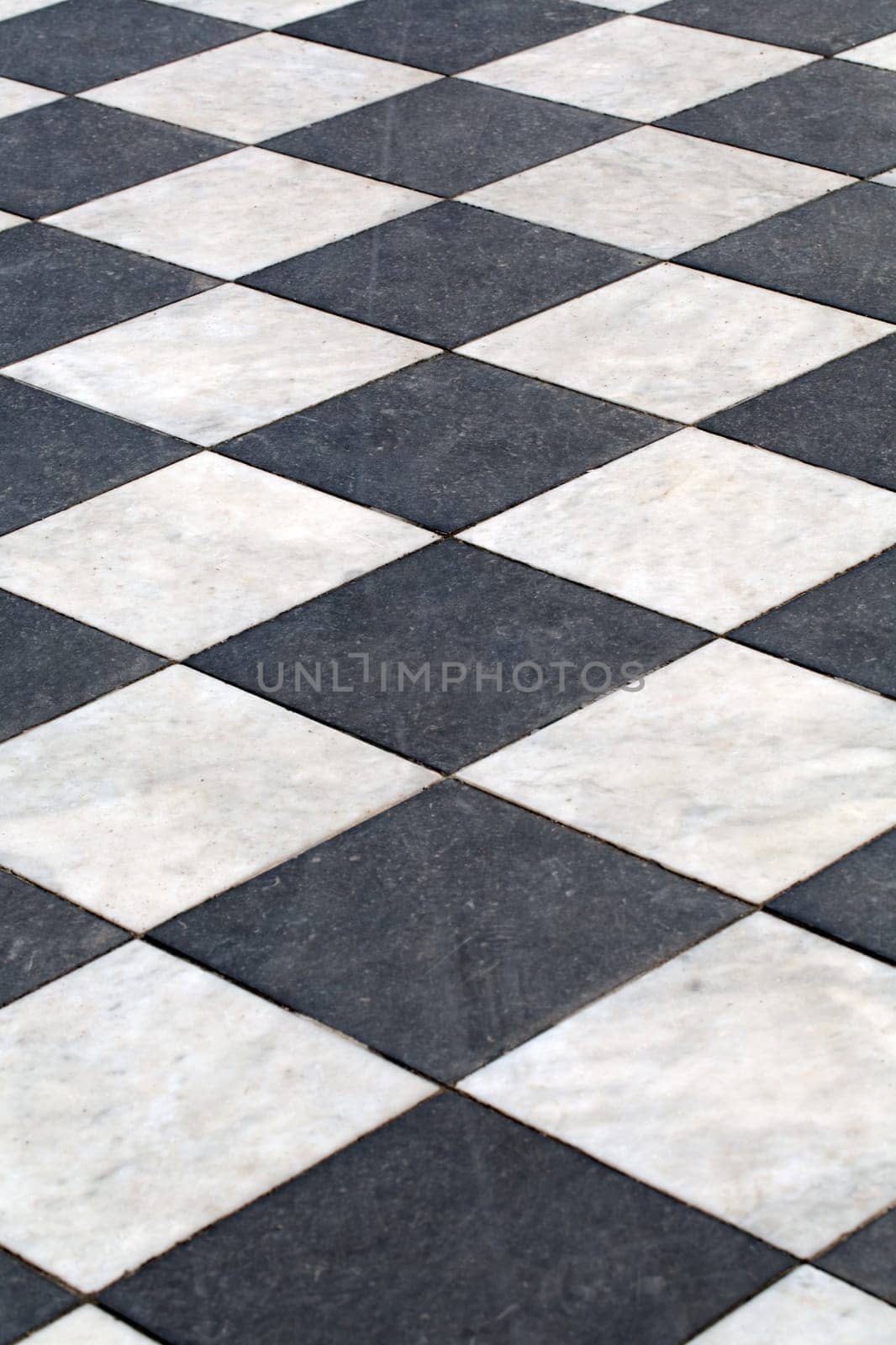 Black and white checkered marble floor pattern