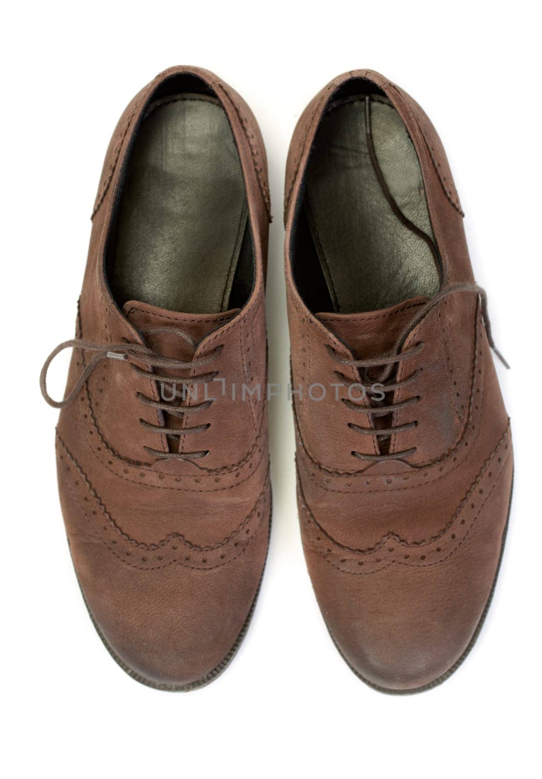 pair of brown casual design women's shoes. View from above. Isolate on white.