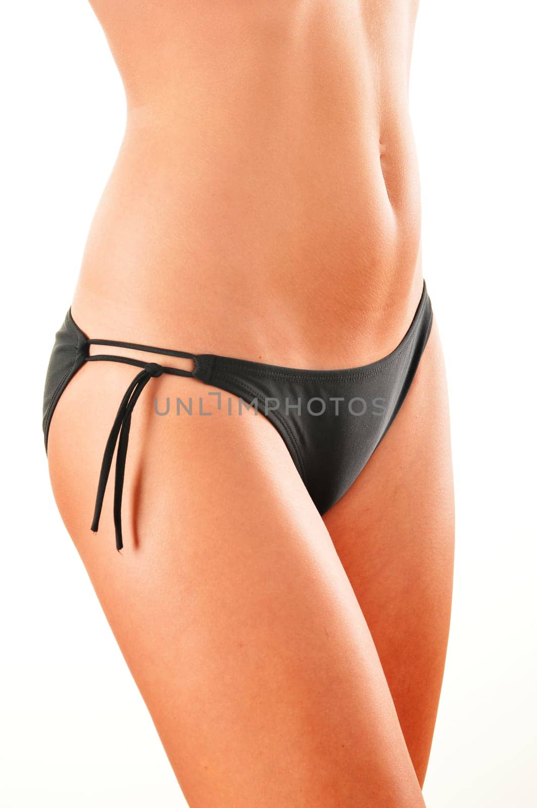 Slim woman's body isolated on white background