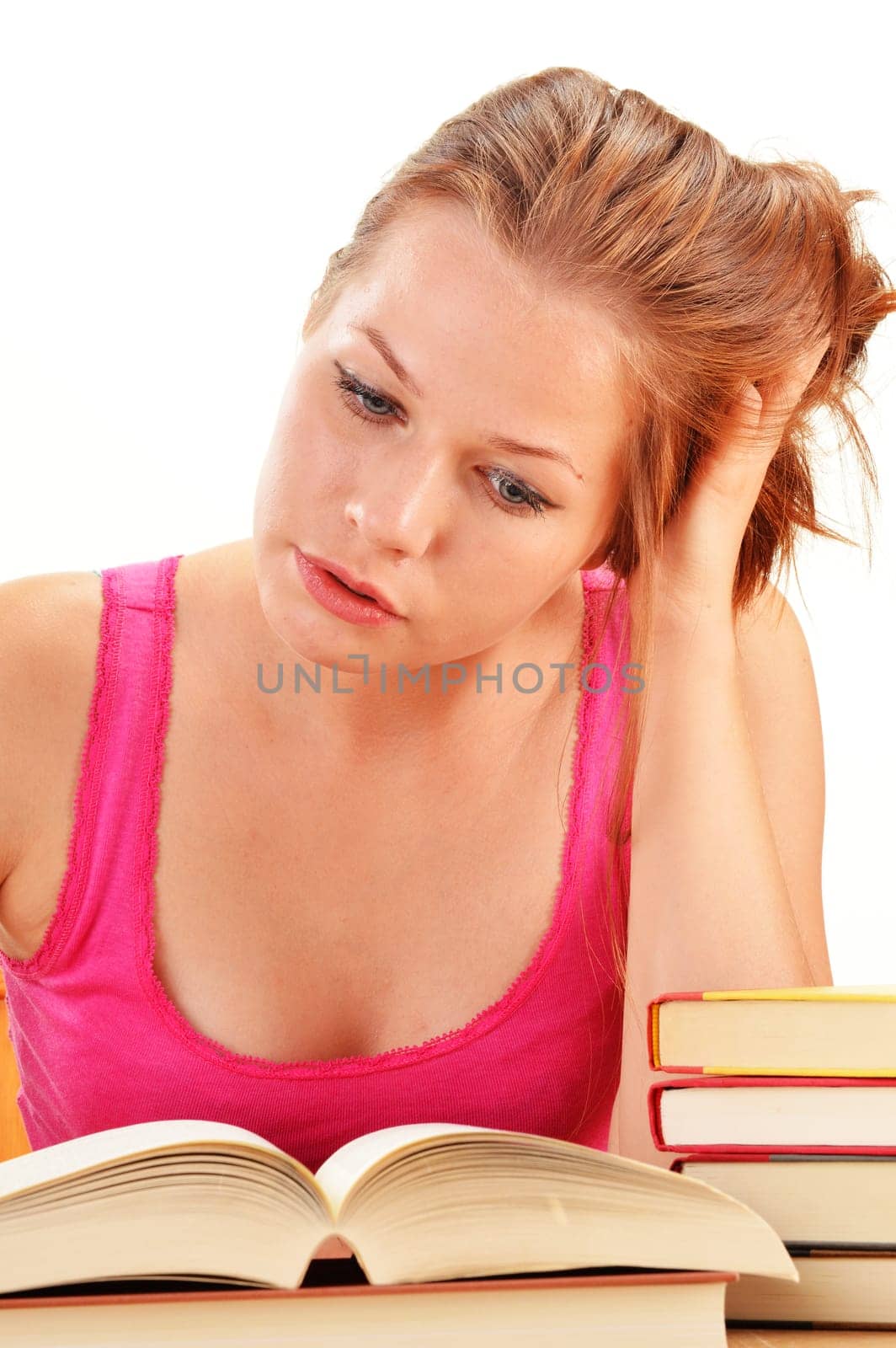 Young woman reading a book. Female student learning