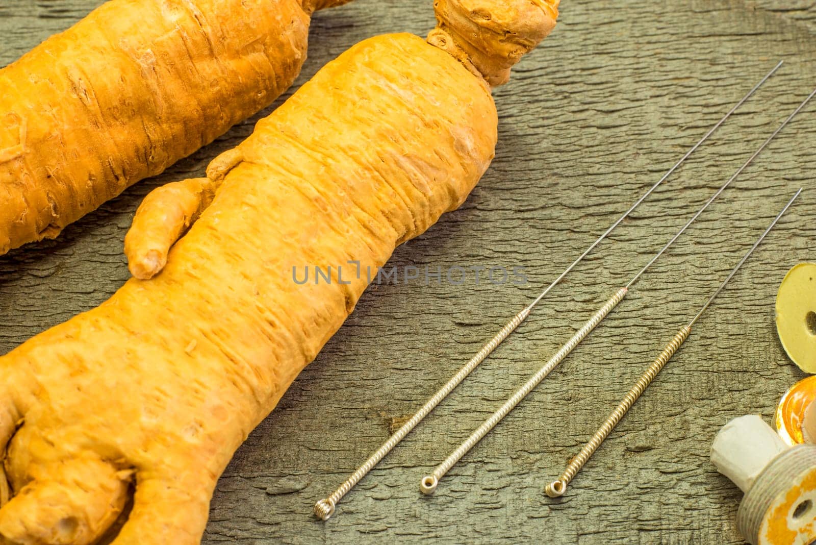Acupuncture needles and ginseng root