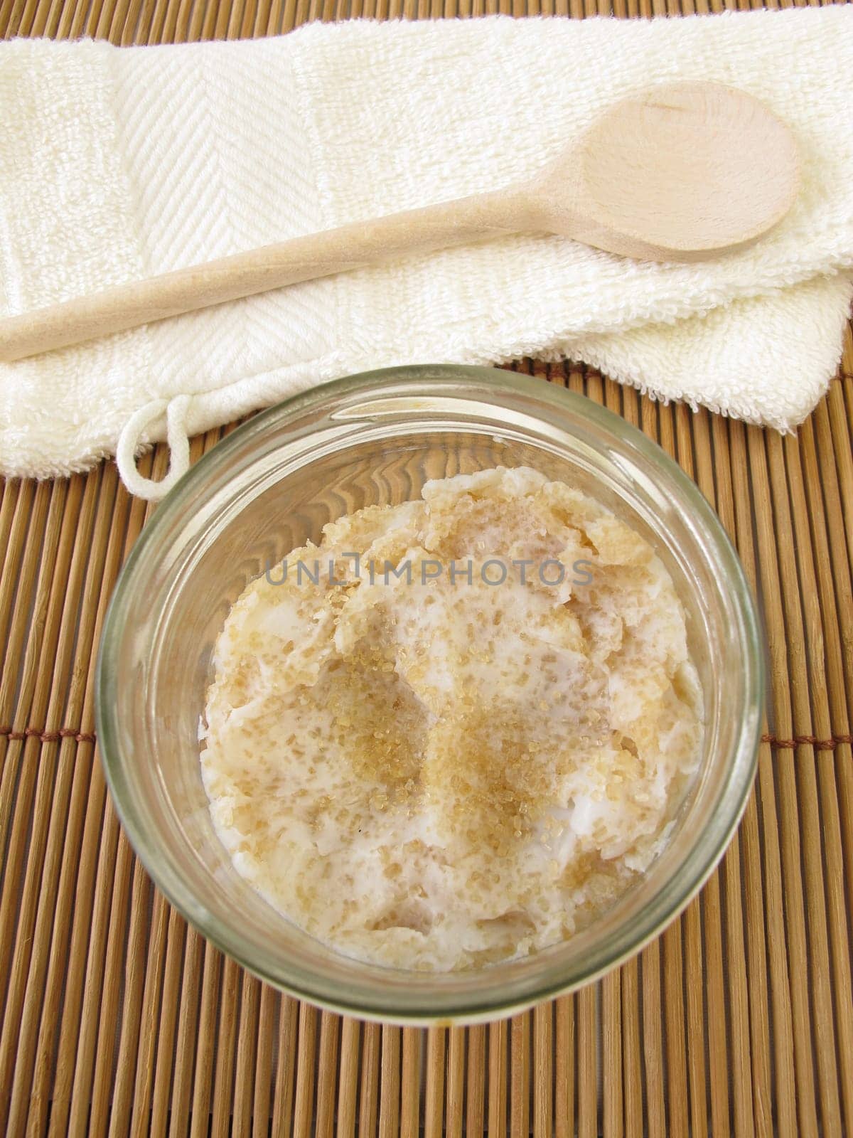 Homemade body scrub with coconut oil and raw cane sugar