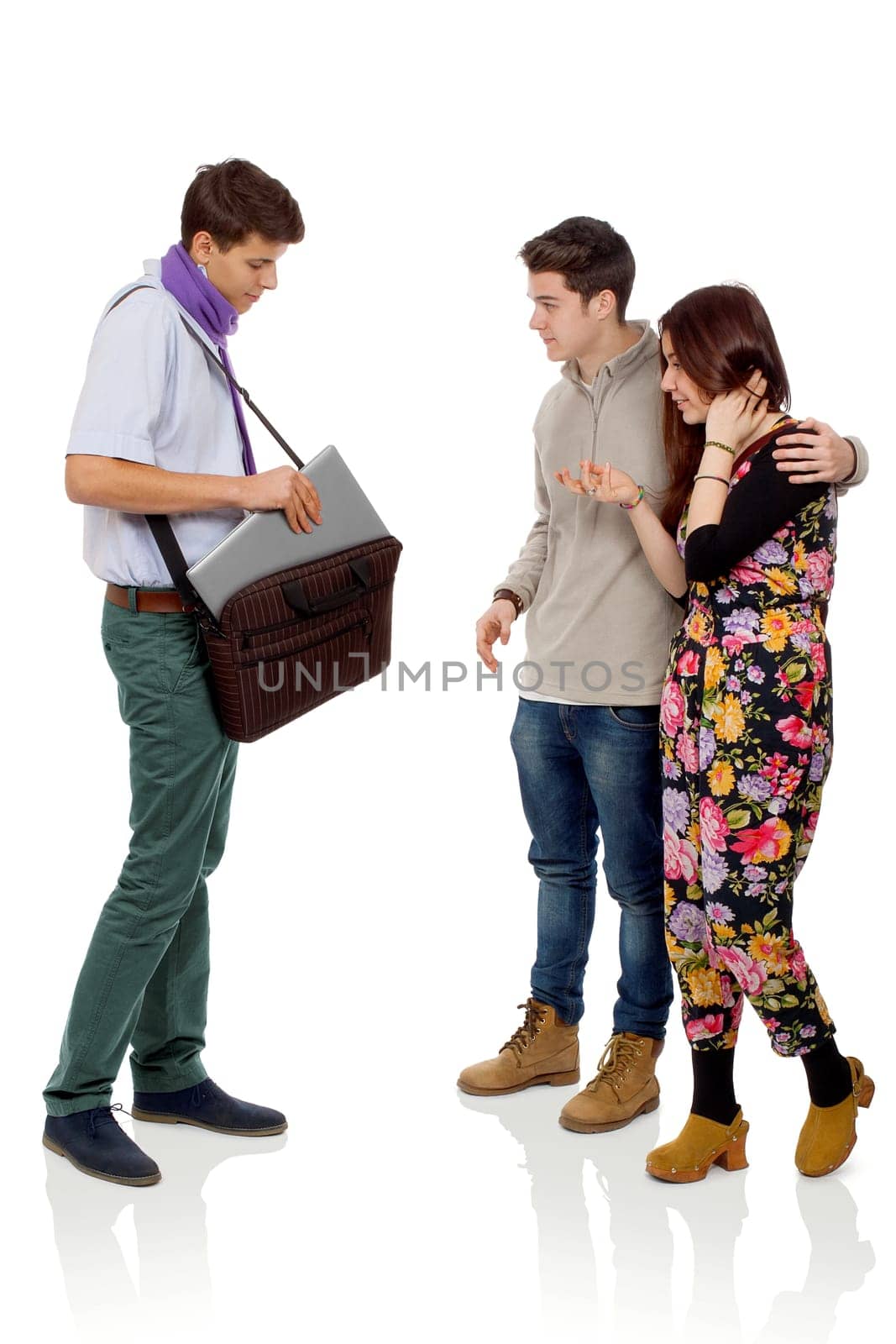 Young man who shows his new laptop to his friends