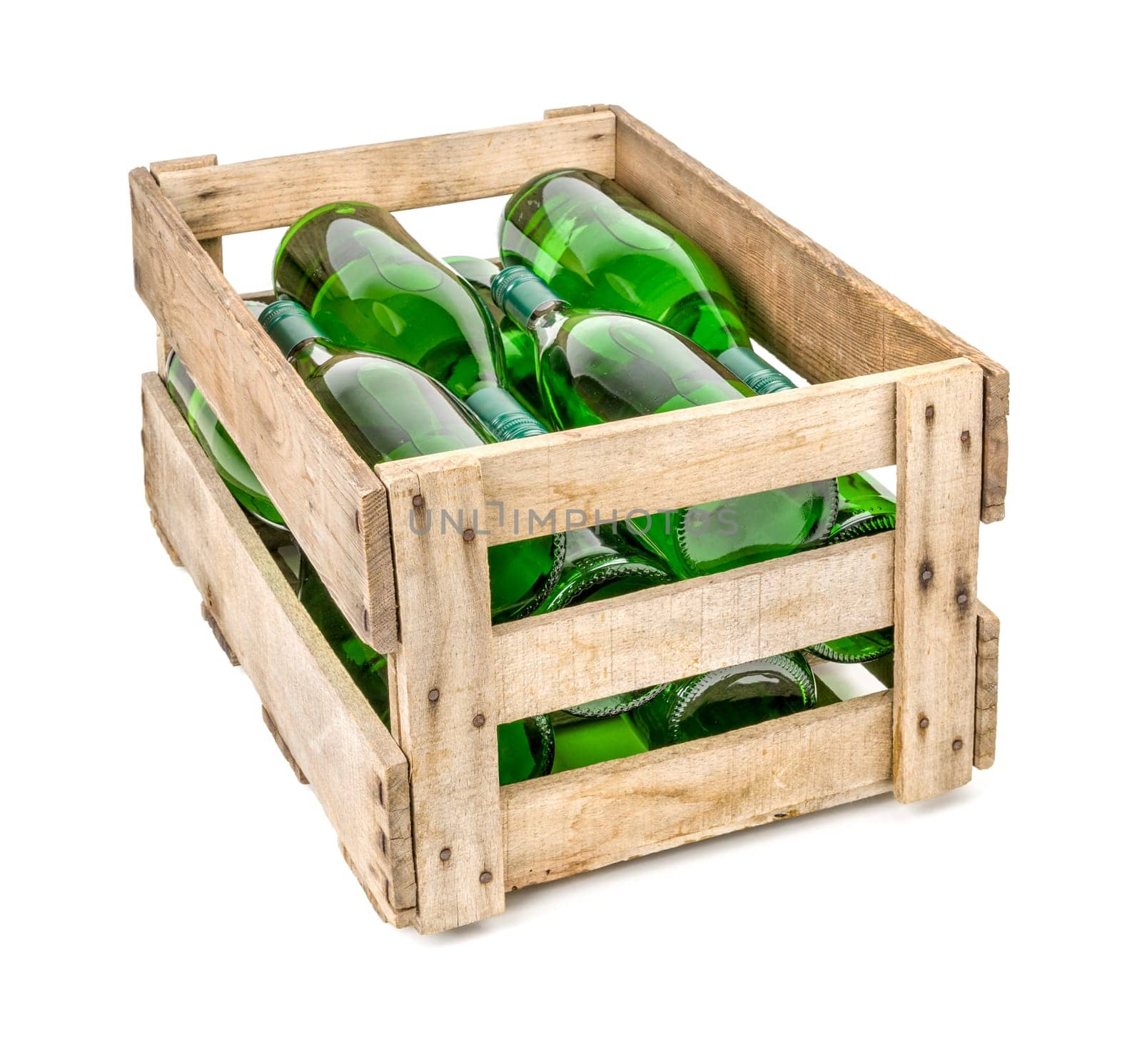 old wooden wine box filled with white wine bottles