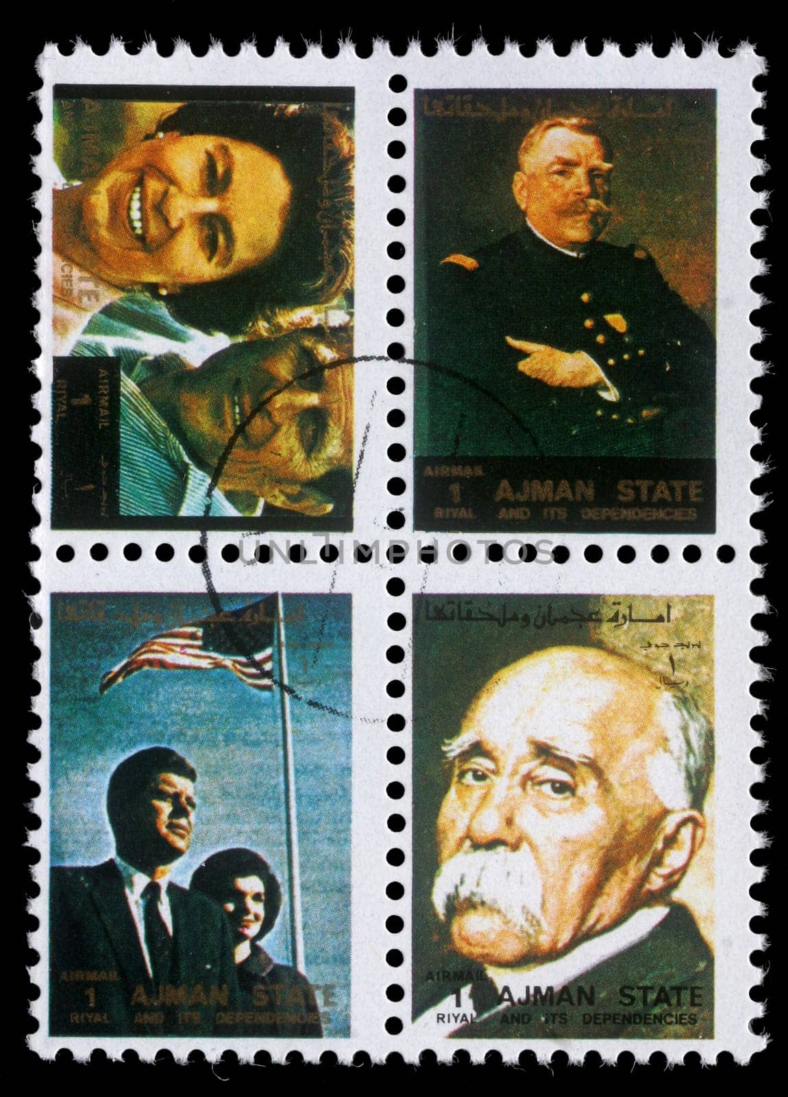 AJMAN - CIRCA 1973: stamp printed by Ajman shows Queen Elizabeth and Prince Philip Mountbatten, American officer, President Kennedy and Jacqueline Kennedy, Georges Clemenceau, circa 1973