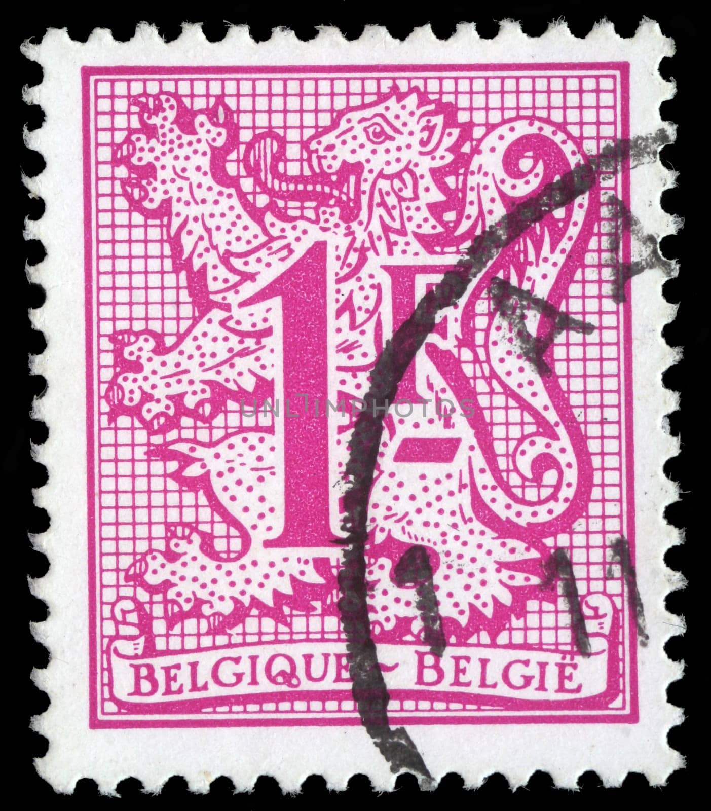 BELGIUM-CIRCA 1951:A stamp printed in Belgium shows image of The coat of arms of the Kingdom of Belgium bears a lion, called the Belgian Lion, or Leo Belgicus, circa 1951.