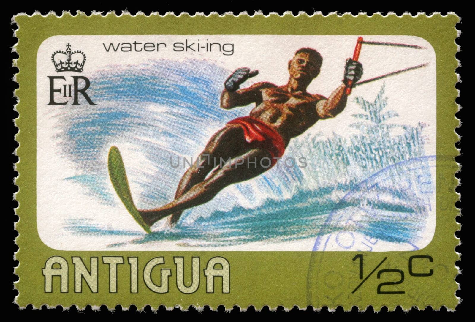 ANTIGUA - CIRCA 1976: A stamp printed in Antigua shows water skiing, circa 1976
