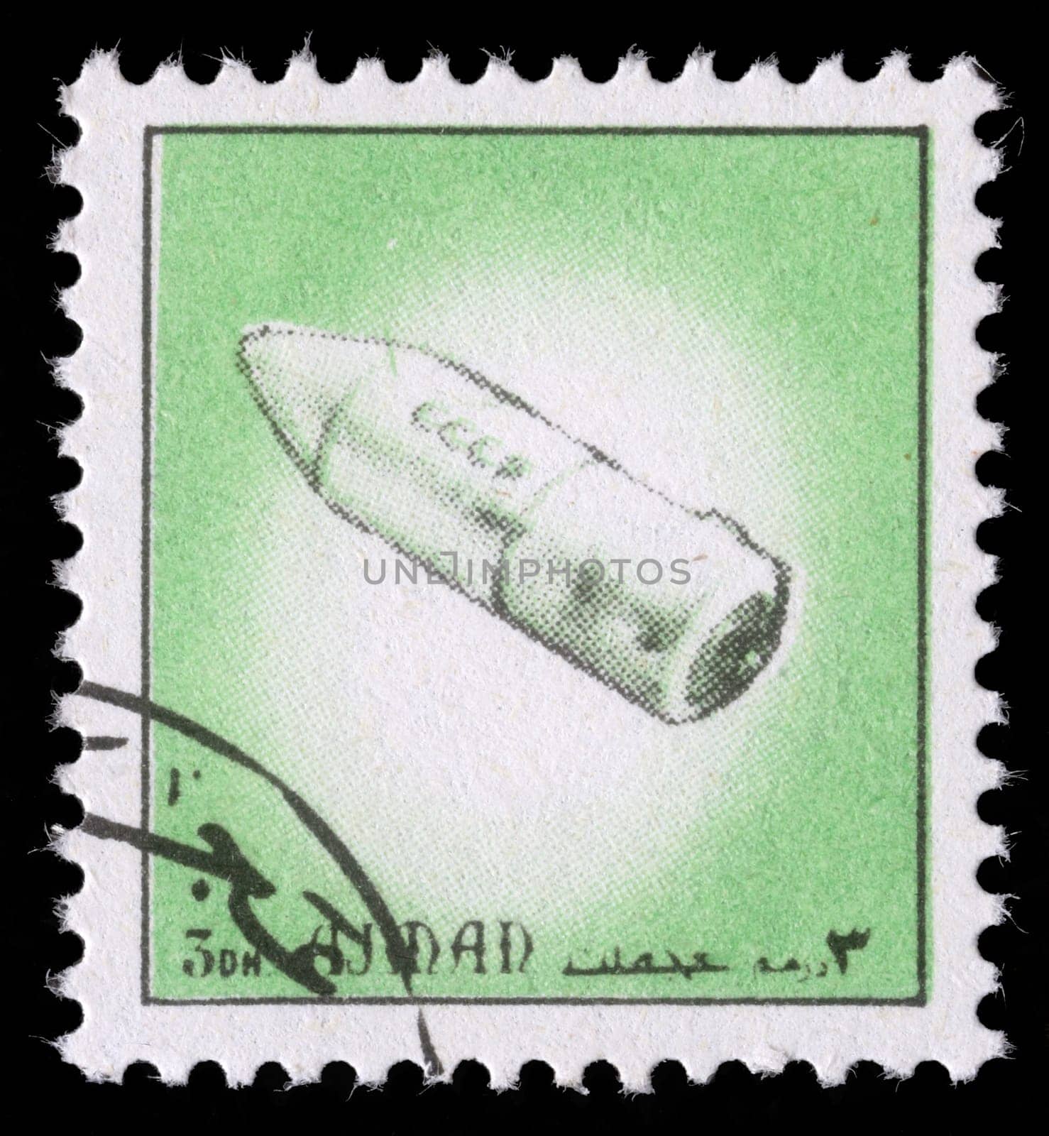 AJMAN - CIRCA 1972: A stamp printed in emirate Ajman show spaceship, circa 1972