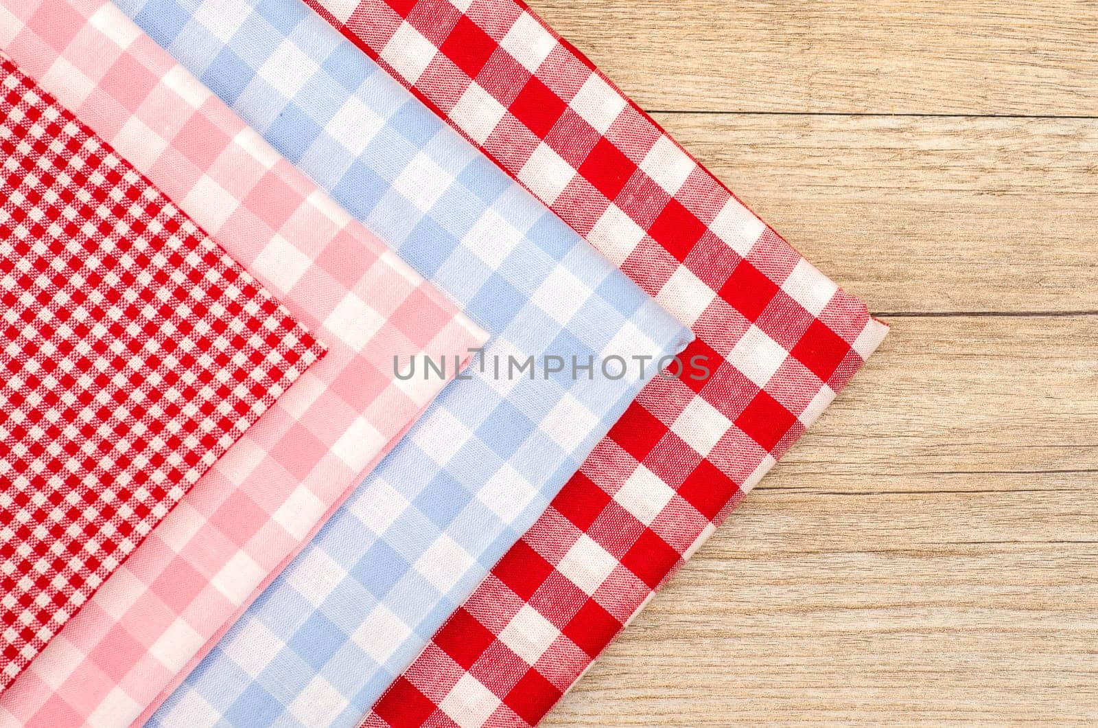 Checkered stacked fabrics in red,pink and blue