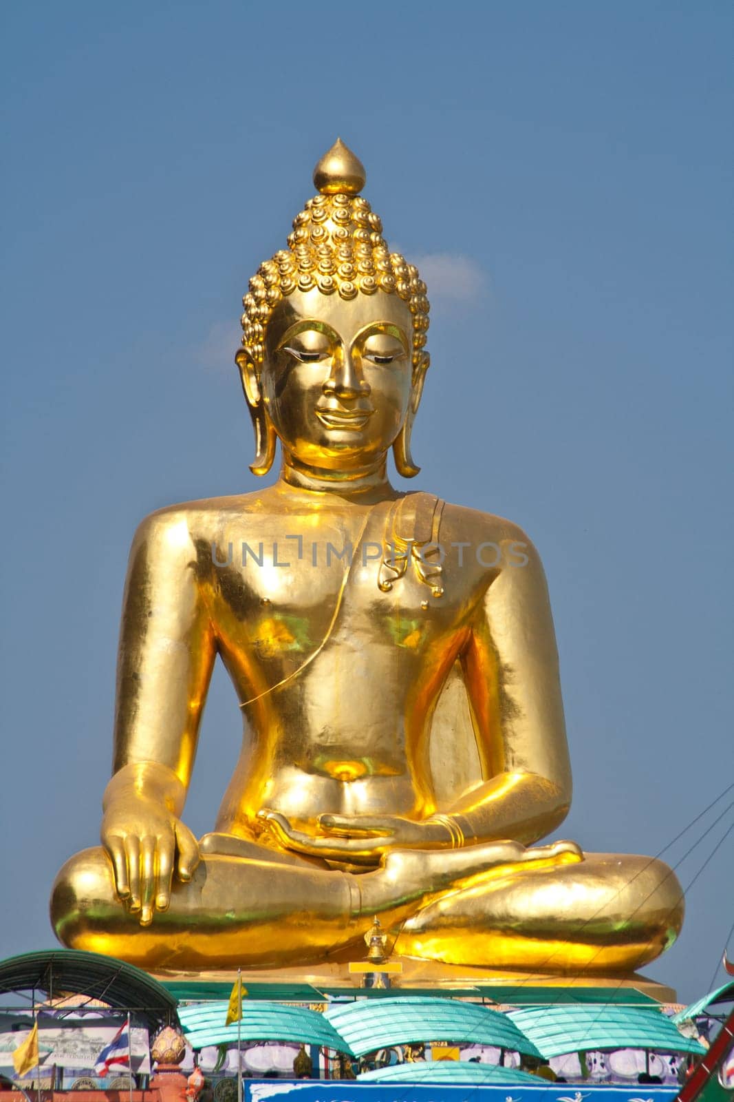 Big Buddha statue under the blue sky.