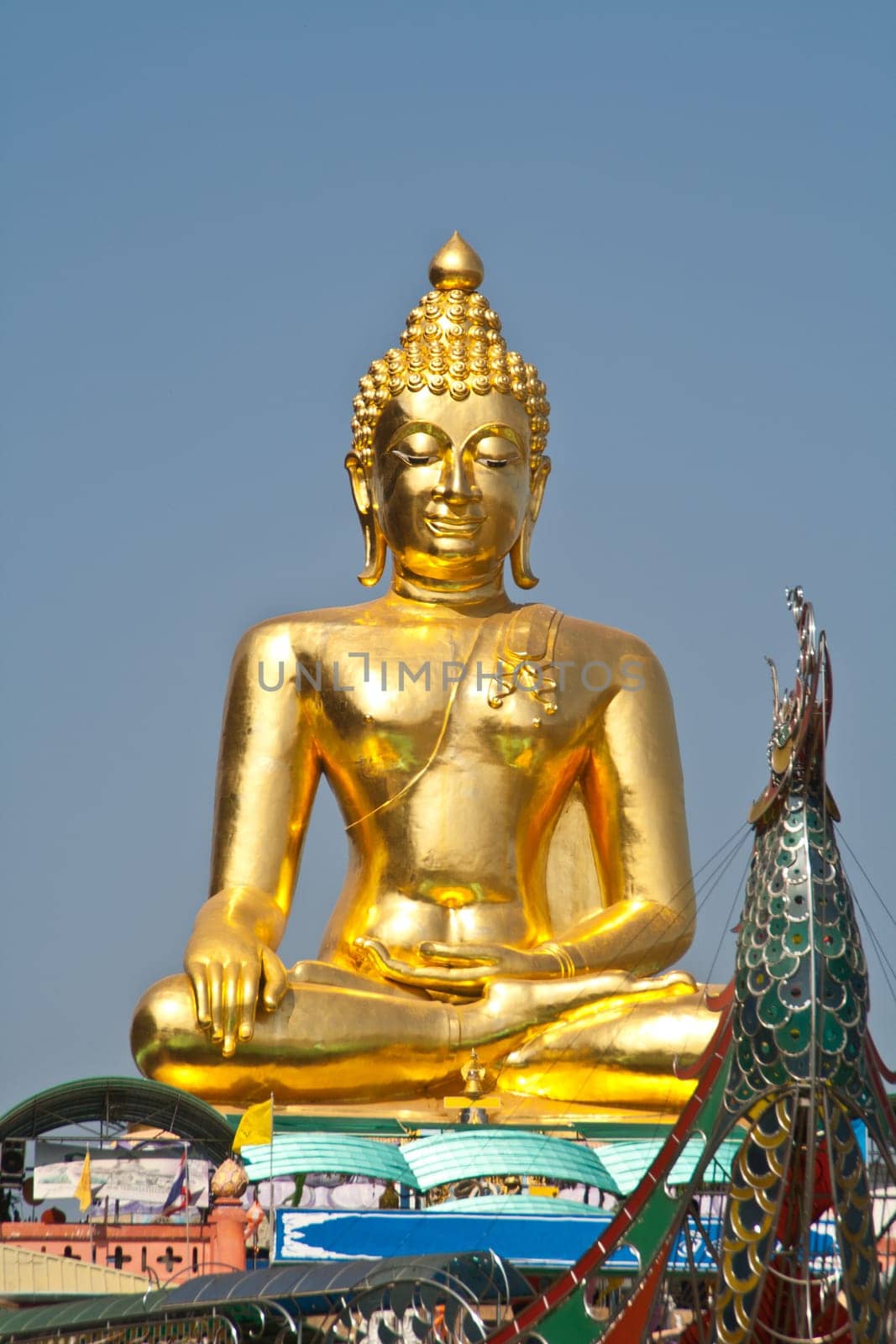 Big Buddha statue under the blue sky.
