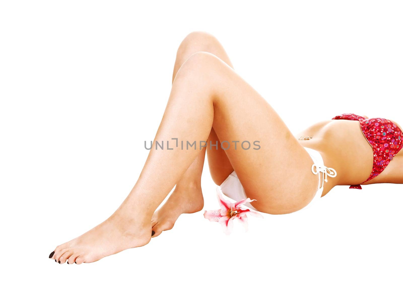 A young woman lying in her bikini on the floor with a red bra and white.panty, showing her gorgeous legs..