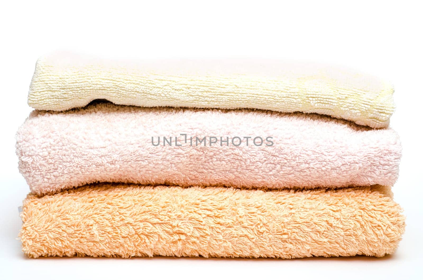 Stack of towels against a white background