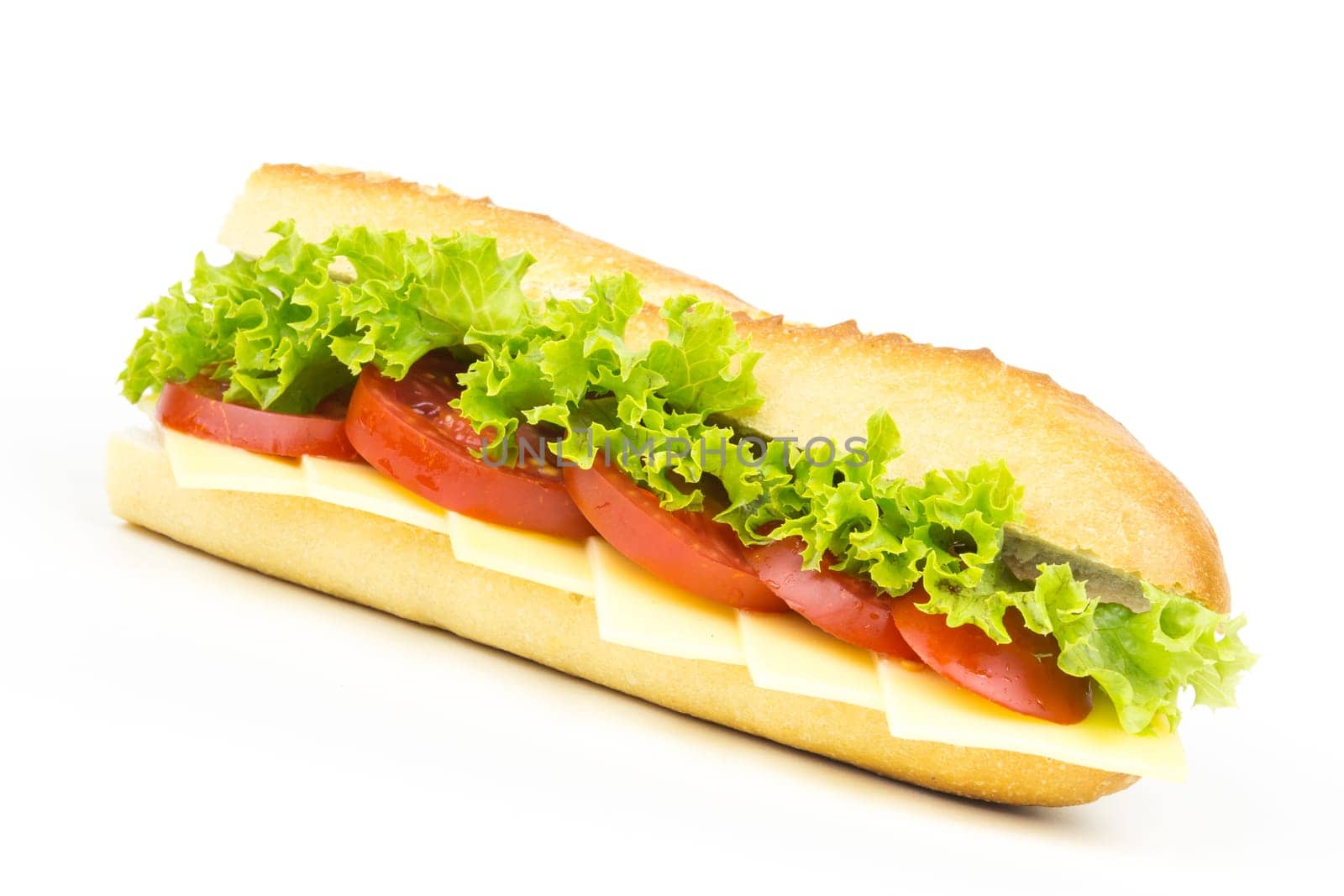Sandwich with cheese tomatoes and salad
