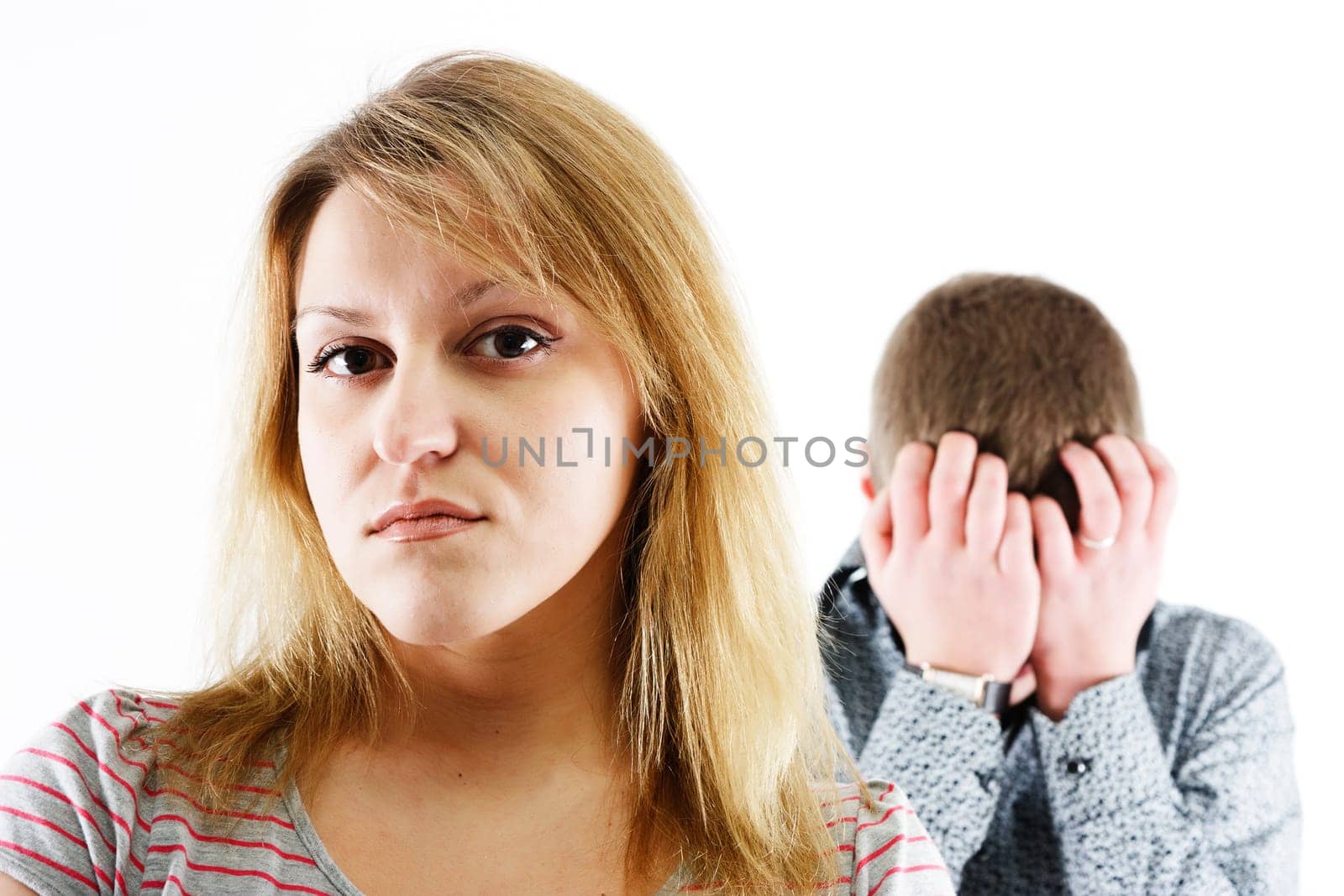 Portrait of a woman facing away from the man