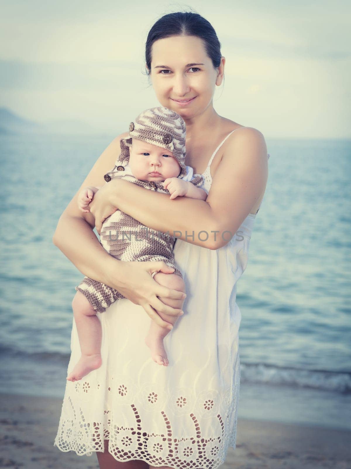 Baby and mom on the beach