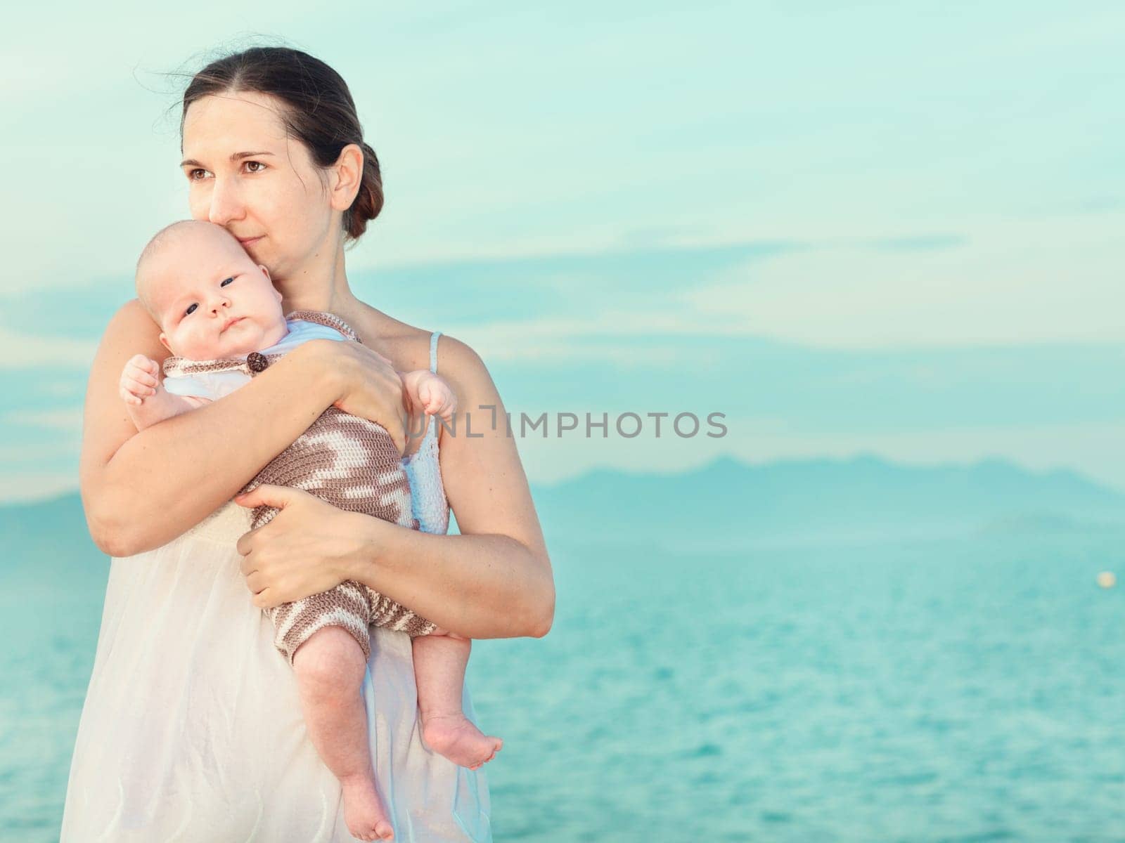Baby and mom on the beach