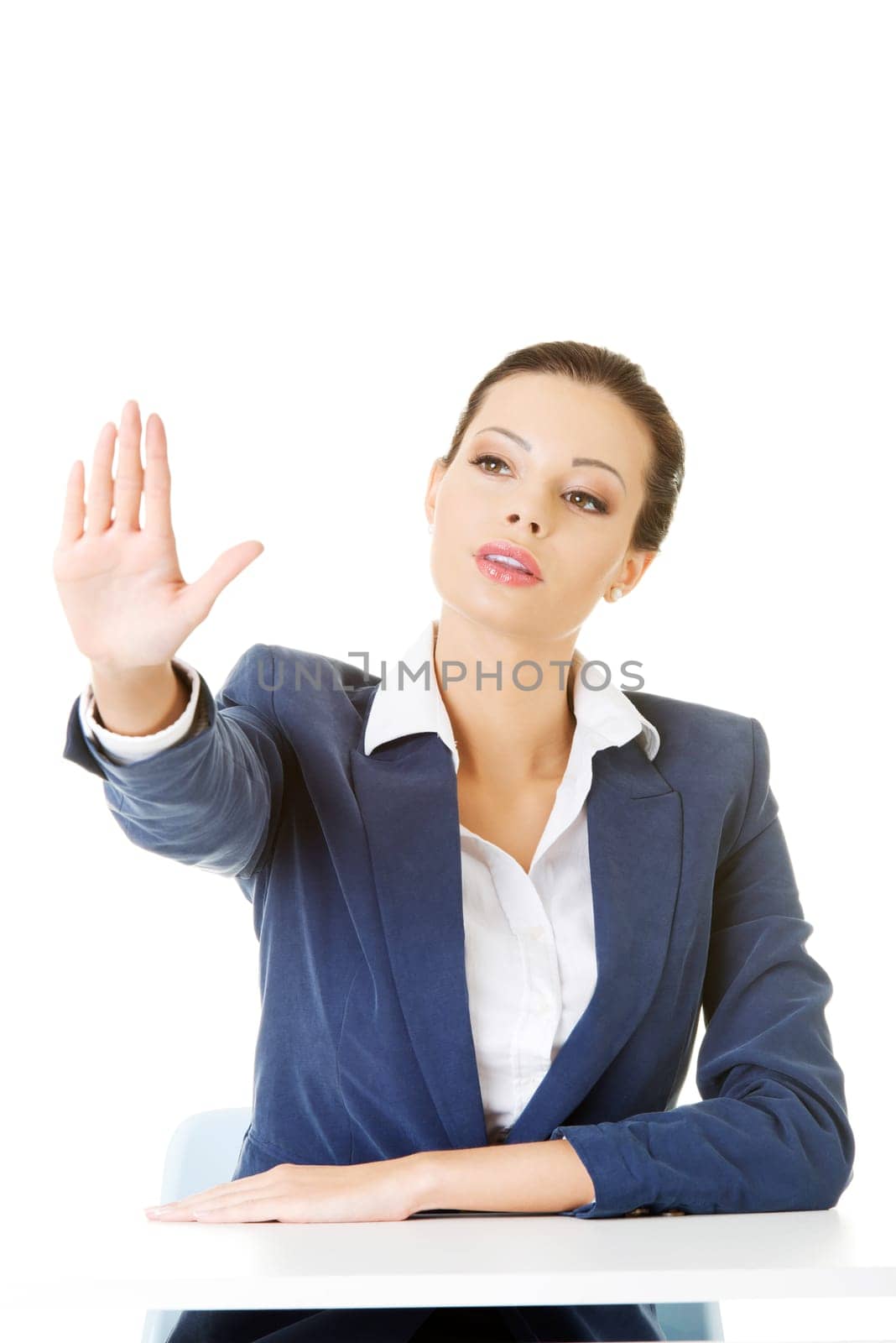Young beautiful businesswoman making choose on abstract screen