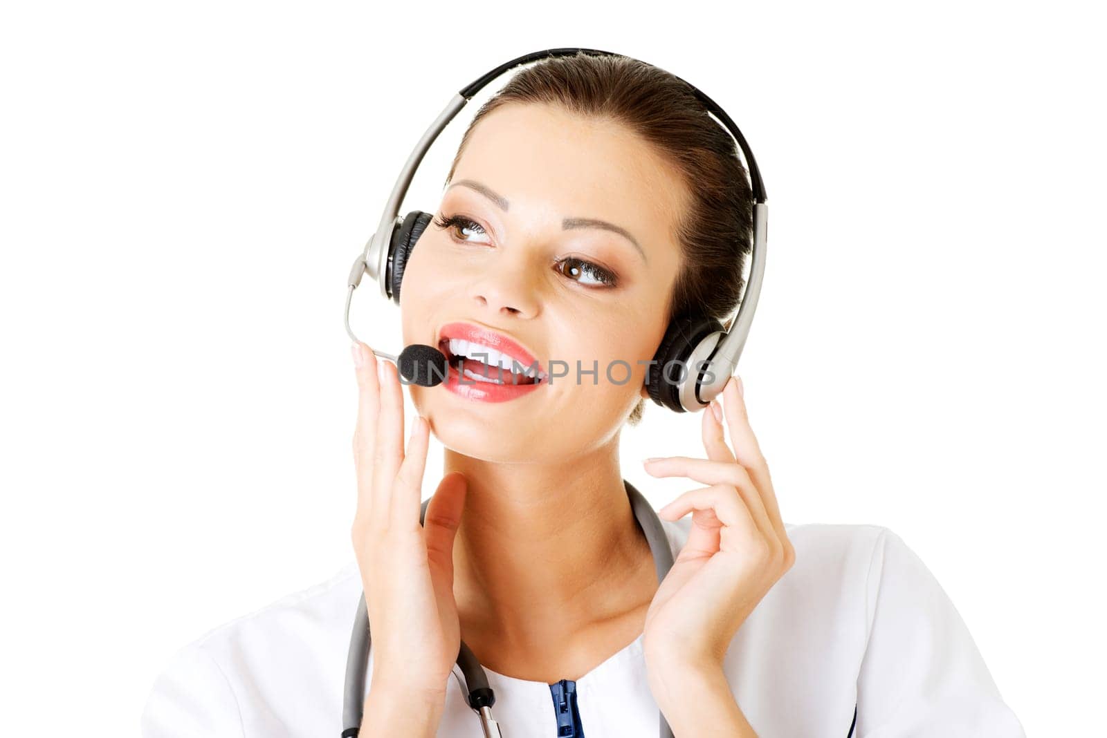 Happy woman doctor wearing headset. Isolated On White